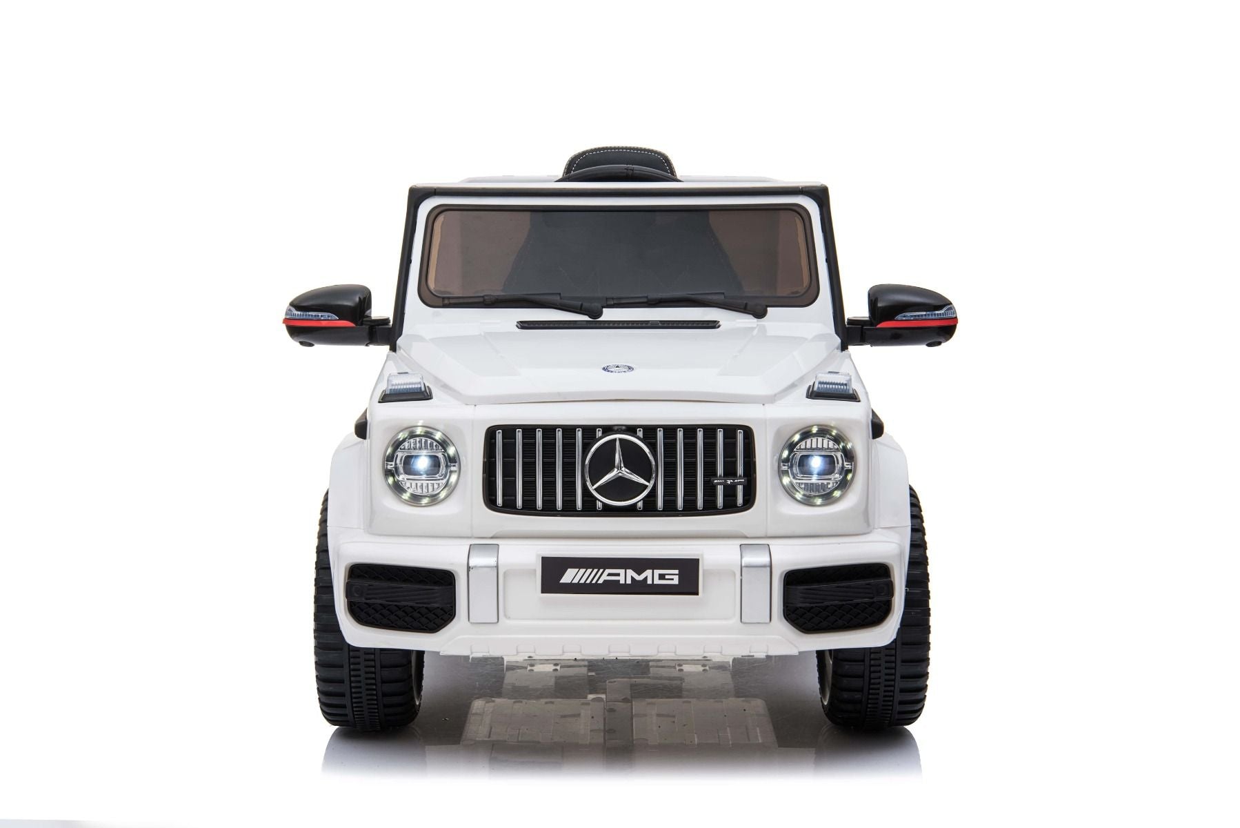 Voiture électrique enfants 12V Mercedes AMG G63 neuve, blanc, avec licence d'origine, porte à batterie, ouverture par des portes, monoplace, 2x moteur, batterie 12 V, télécommande de 2,4 Ghz, suspension arrière, démarrage en douceur