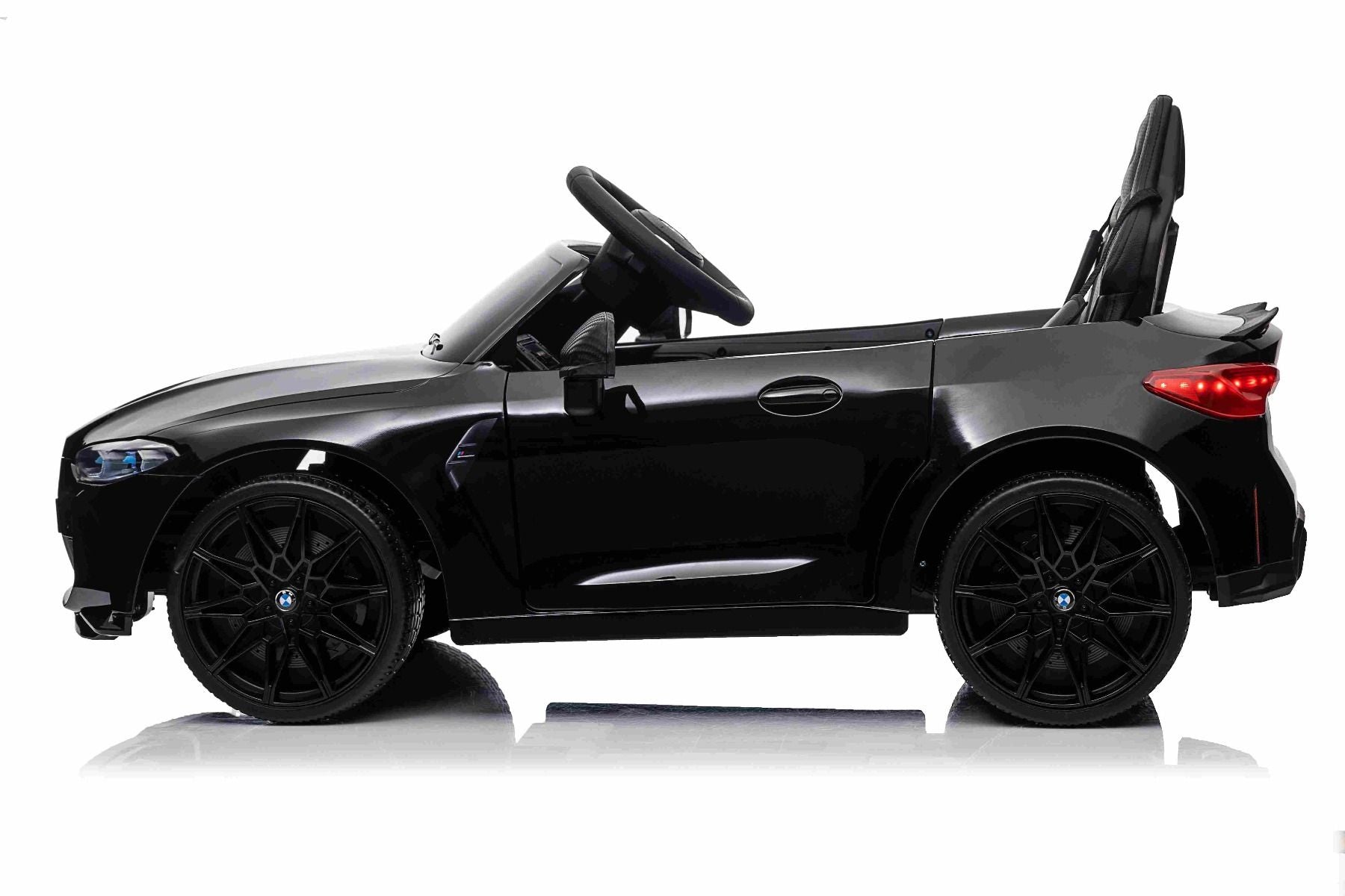 Voiture électrique à conducteur porté BMW M4, noire, télécommande 2,4 GHz, entrée USB / Aux, suspension, batterie 12V, lumières LED, 2 X moteur, licence ORIGINALE
