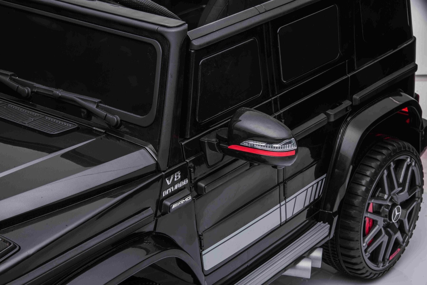 Voiture électrique enfant 12V Mercedes G avec portes hautes, noir, avec télécommande 2,4 GHz