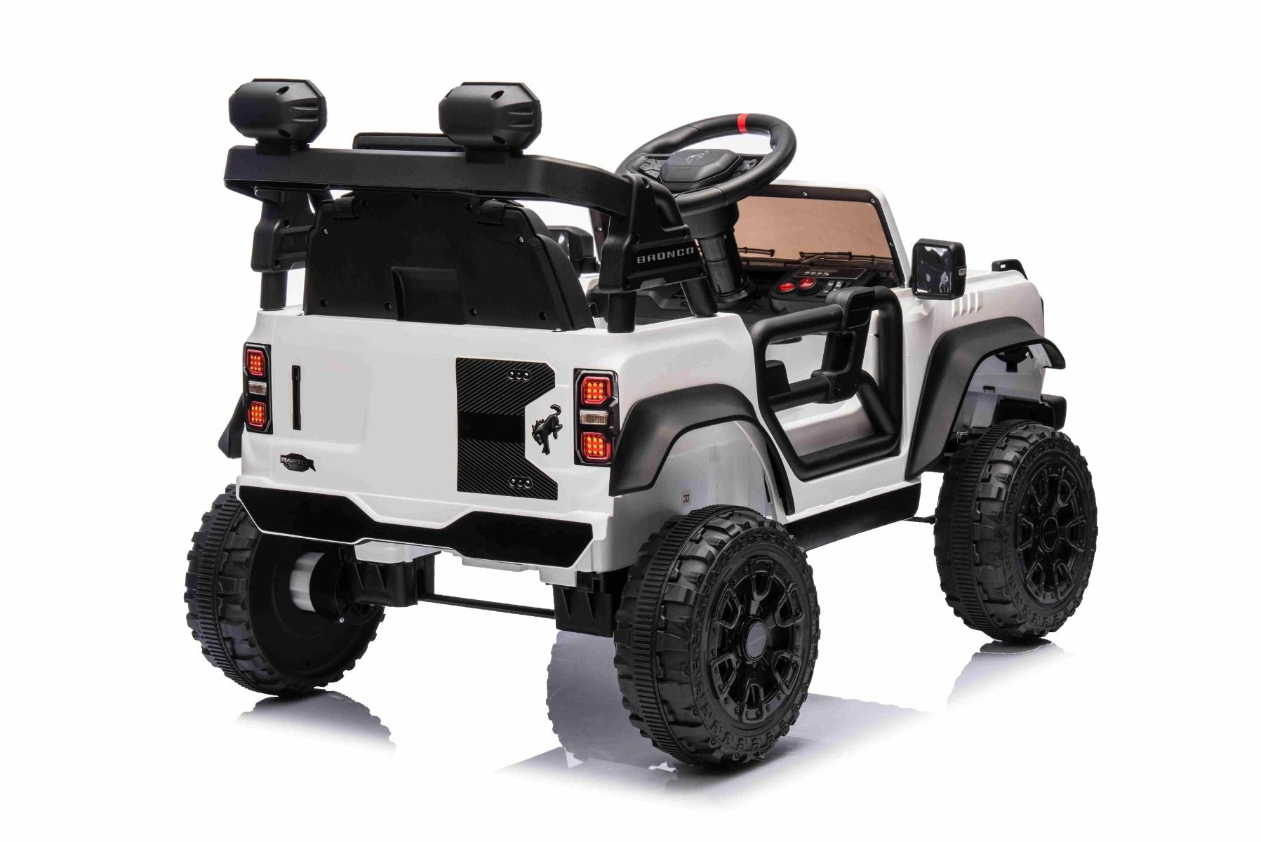 Voiture électrique Ford Bronco avec traction arrière, sous licence (siège unique), blanche, batterie lithium, haute garde au sol, siège large, suspension de l'essieu arrière, télécommande 2,4 GHz, lecteur MP3 avec entrée USB, feux LED.
