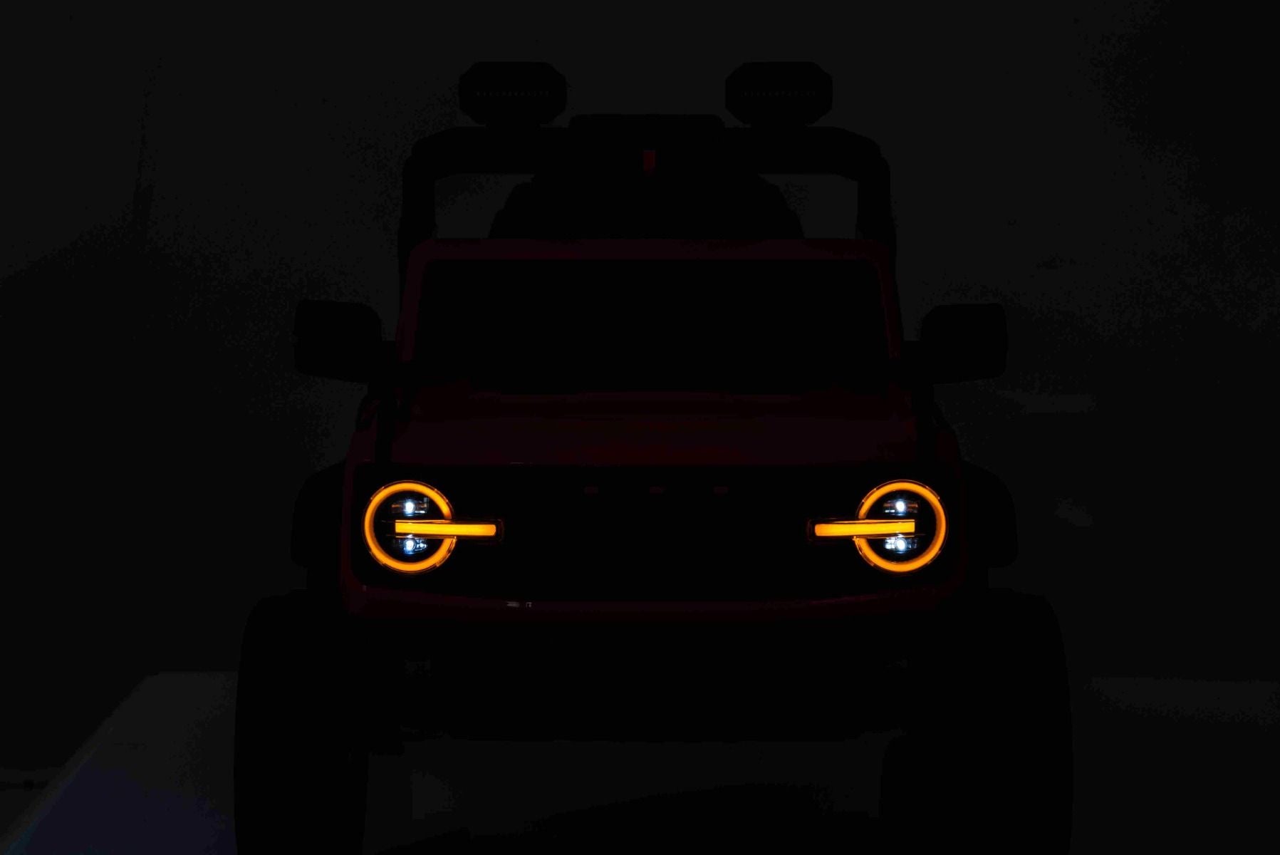 Voiture électrique Ford Bronco avec traction arrière, sous licence (siège unique), rose, batterie lithium, haute garde au sol, siège large, suspension de l'essieu arrière, télécommande 2,4 GHz, lecteur MP3 avec entrée USB, feux LED