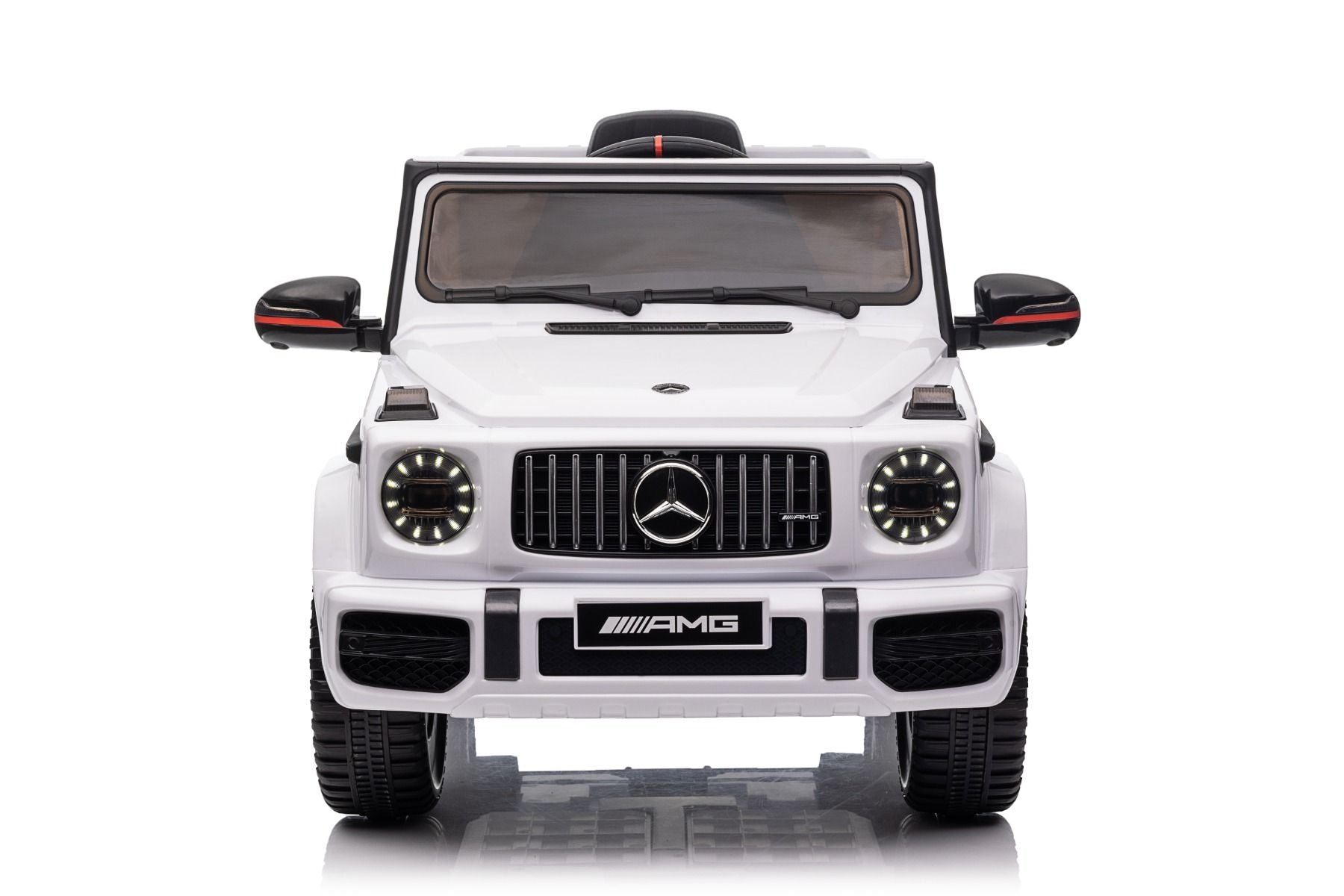 Voiture électrique enfants 12V Mercedes AMG G63 neuve, blanc, avec licence d'origine, porte à batterie, ouverture par des portes, monoplace, 2x moteur, batterie 12 V, télécommande de 2,4 Ghz, suspension arrière, démarrage en douceur
