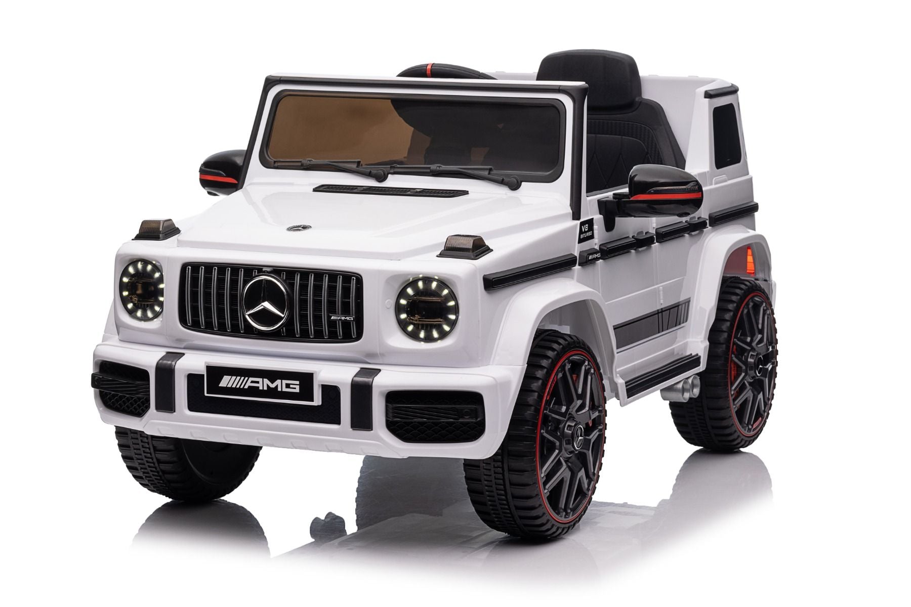 Voiture électrique enfants 12V Mercedes AMG G63 neuve, blanc, avec licence d'origine, porte à batterie, ouverture par des portes, monoplace, 2x moteur, batterie 12 V, télécommande de 2,4 Ghz, suspension arrière, démarrage en douceur