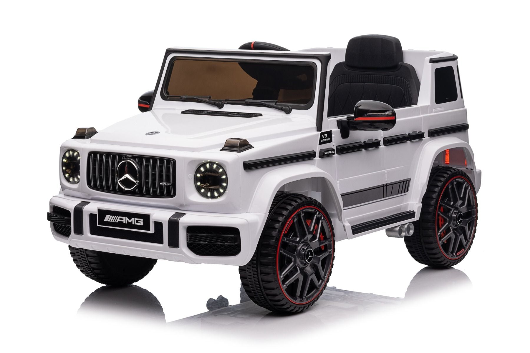 Voiture électrique enfants 12V Mercedes AMG G63 neuve, blanc, avec licence d'origine, porte à batterie, ouverture par des portes, monoplace, 2x moteur, batterie 12 V, télécommande de 2,4 Ghz, suspension arrière, démarrage en douceur