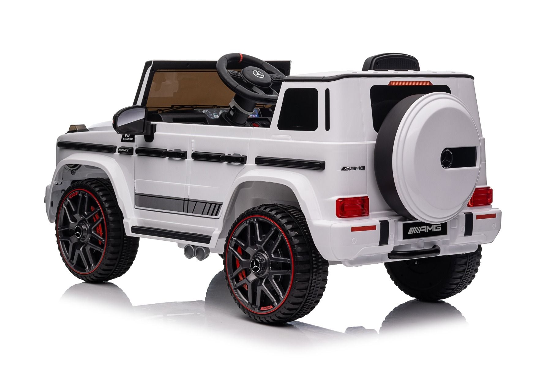Voiture électrique enfants 12V Mercedes AMG G63 neuve, blanc, avec licence d'origine, porte à batterie, ouverture par des portes, monoplace, 2x moteur, batterie 12 V, télécommande de 2,4 Ghz, suspension arrière, démarrage en douceur