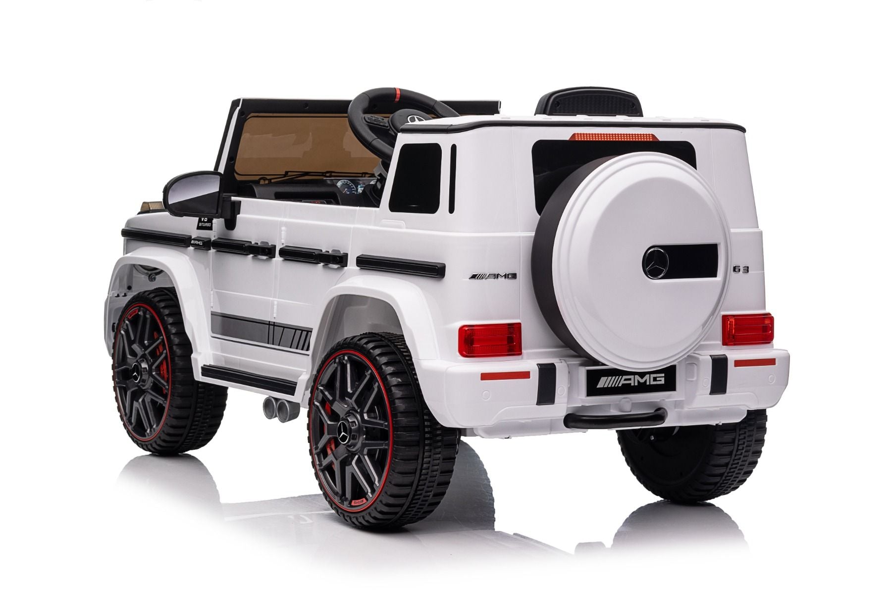 Voiture électrique enfants 12V Mercedes AMG G63 neuve, blanc, avec licence d'origine, porte à batterie, ouverture par des portes, monoplace, 2x moteur, batterie 12 V, télécommande de 2,4 Ghz, suspension arrière, démarrage en douceur