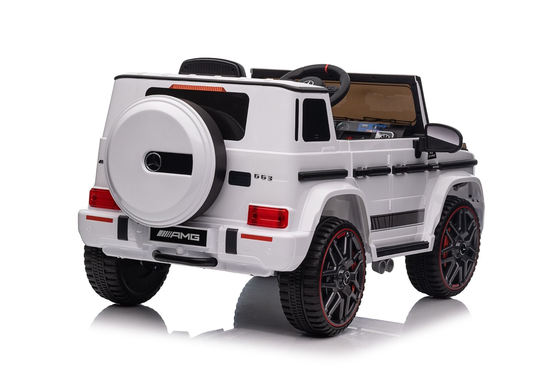 Voiture électrique enfants 12V Mercedes AMG G63 neuve, blanc, avec licence d'origine, porte à batterie, ouverture par des portes, monoplace, 2x moteur, batterie 12 V, télécommande de 2,4 Ghz, suspension arrière, démarrage en douceur