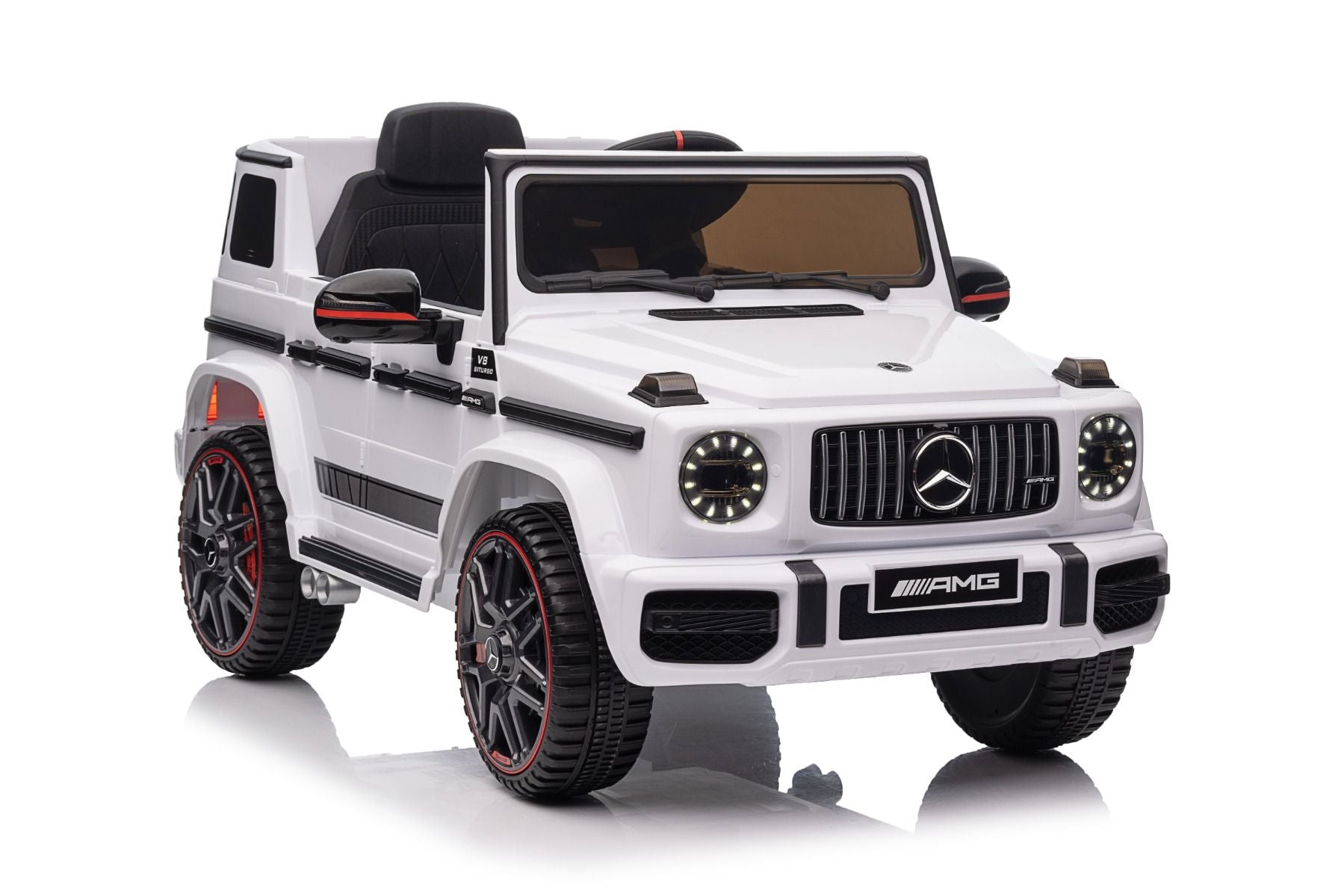 Voiture électrique enfants 12V Mercedes AMG G63 neuve, blanc, avec licence d'origine, porte à batterie, ouverture par des portes, monoplace, 2x moteur, batterie 12 V, télécommande de 2,4 Ghz, suspension arrière, démarrage en douceur