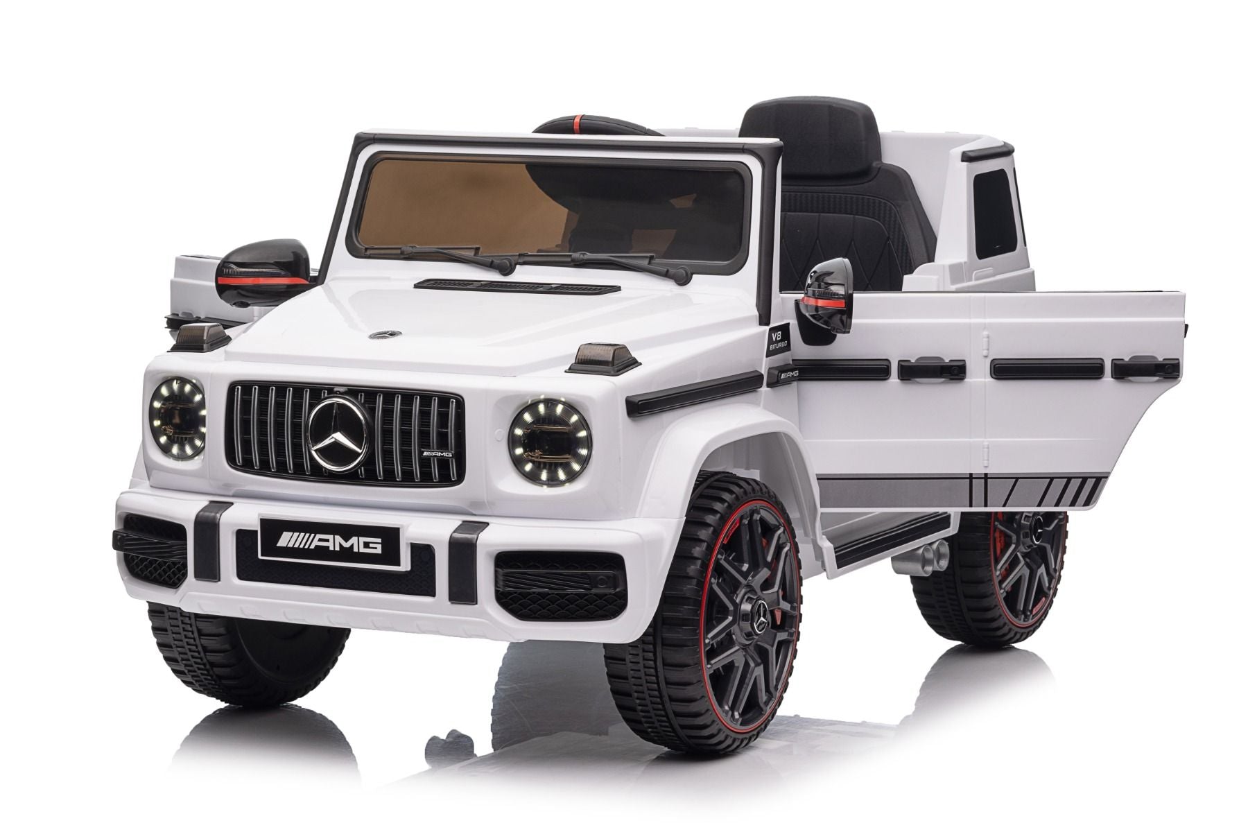Voiture électrique enfants 12V Mercedes AMG G63 neuve, blanc, avec licence d'origine, porte à batterie, ouverture par des portes, monoplace, 2x moteur, batterie 12 V, télécommande de 2,4 Ghz, suspension arrière, démarrage en douceur