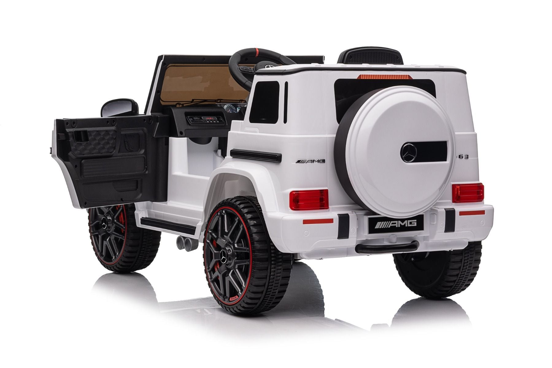 Voiture électrique enfants 12V Mercedes AMG G63 neuve, blanc, avec licence d'origine, porte à batterie, ouverture par des portes, monoplace, 2x moteur, batterie 12 V, télécommande de 2,4 Ghz, suspension arrière, démarrage en douceur