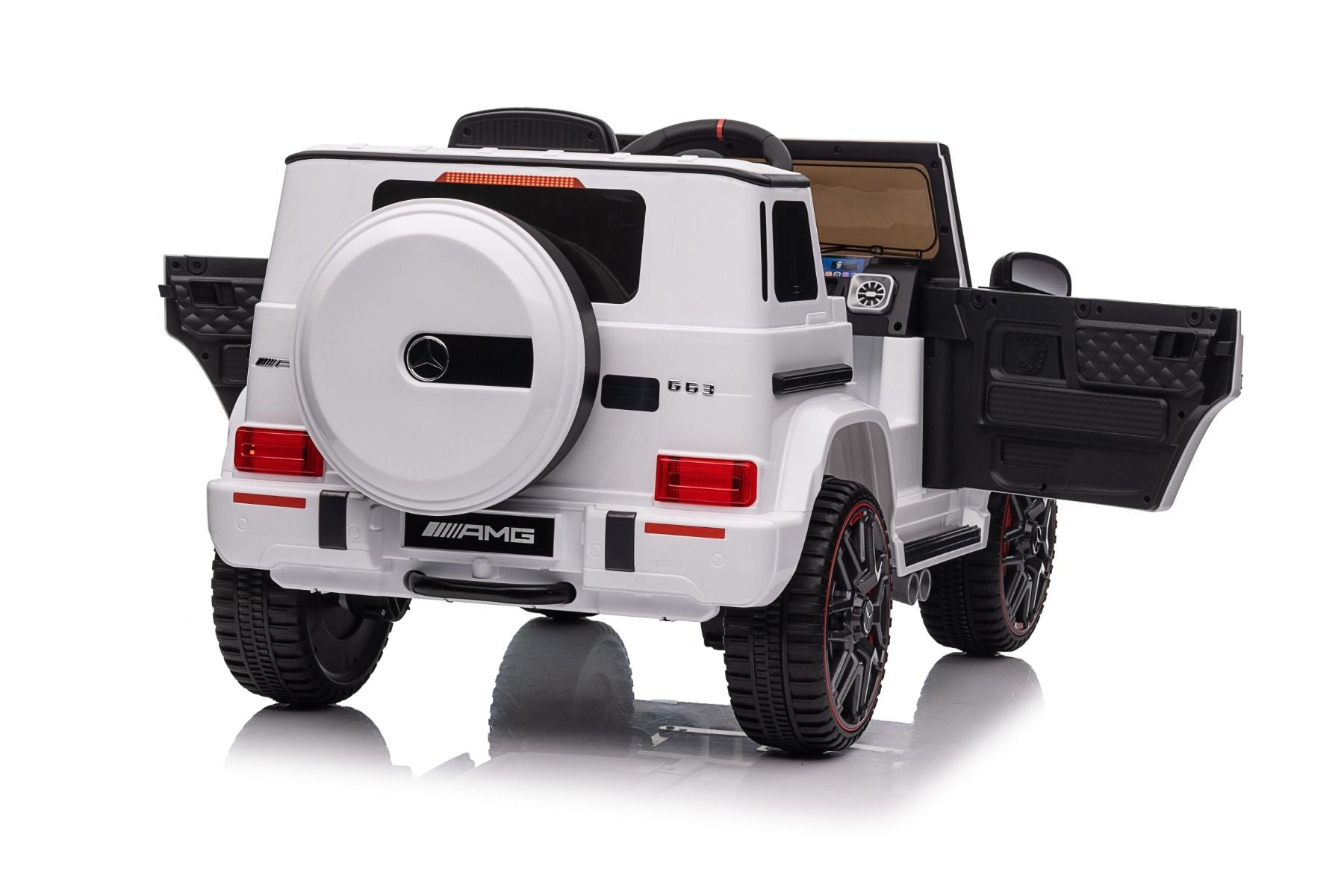 Voiture électrique enfants 12V Mercedes AMG G63 neuve, blanc, avec licence d'origine, porte à batterie, ouverture par des portes, monoplace, 2x moteur, batterie 12 V, télécommande de 2,4 Ghz, suspension arrière, démarrage en douceur