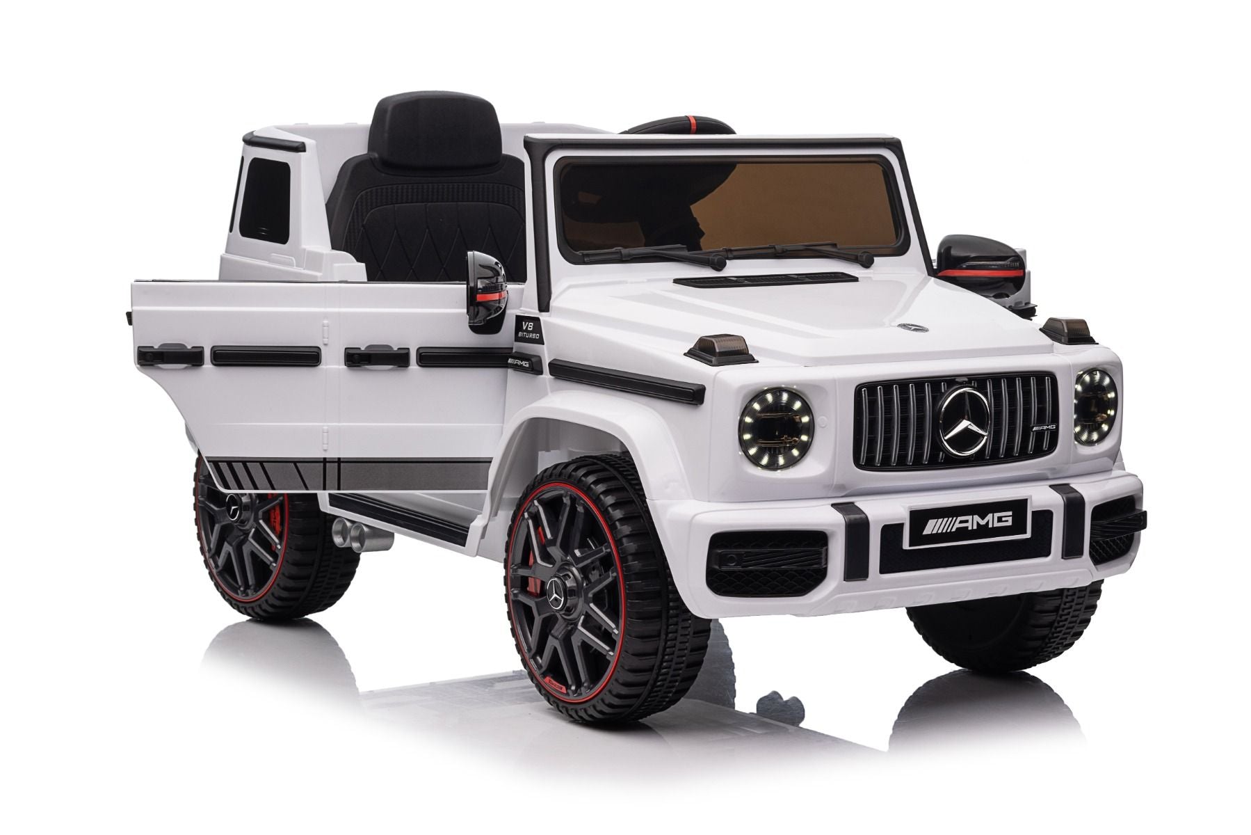 Voiture électrique enfants 12V Mercedes AMG G63 neuve, blanc, avec licence d'origine, porte à batterie, ouverture par des portes, monoplace, 2x moteur, batterie 12 V, télécommande de 2,4 Ghz, suspension arrière, démarrage en douceur