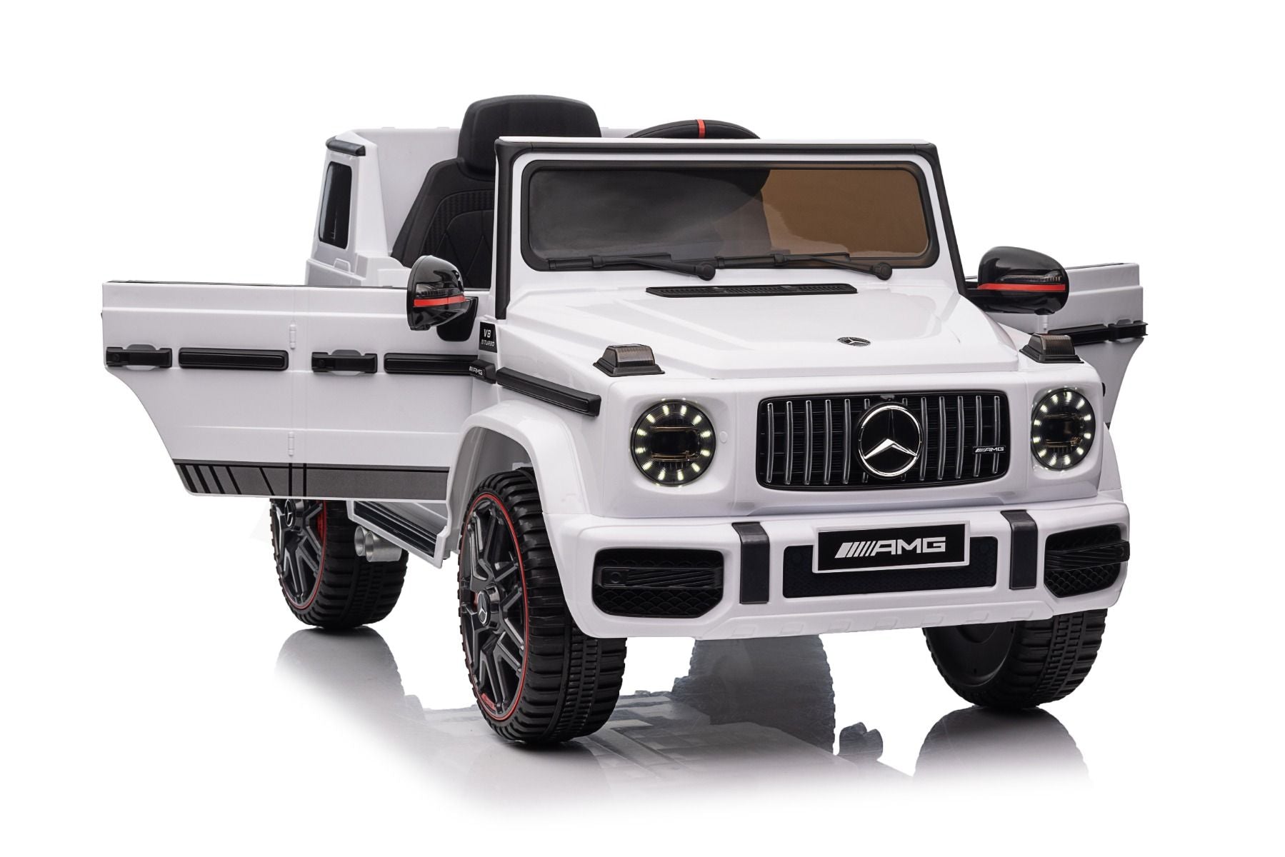 Voiture électrique enfants 12V Mercedes AMG G63 neuve, blanc, avec licence d'origine, porte à batterie, ouverture par des portes, monoplace, 2x moteur, batterie 12 V, télécommande de 2,4 Ghz, suspension arrière, démarrage en douceur