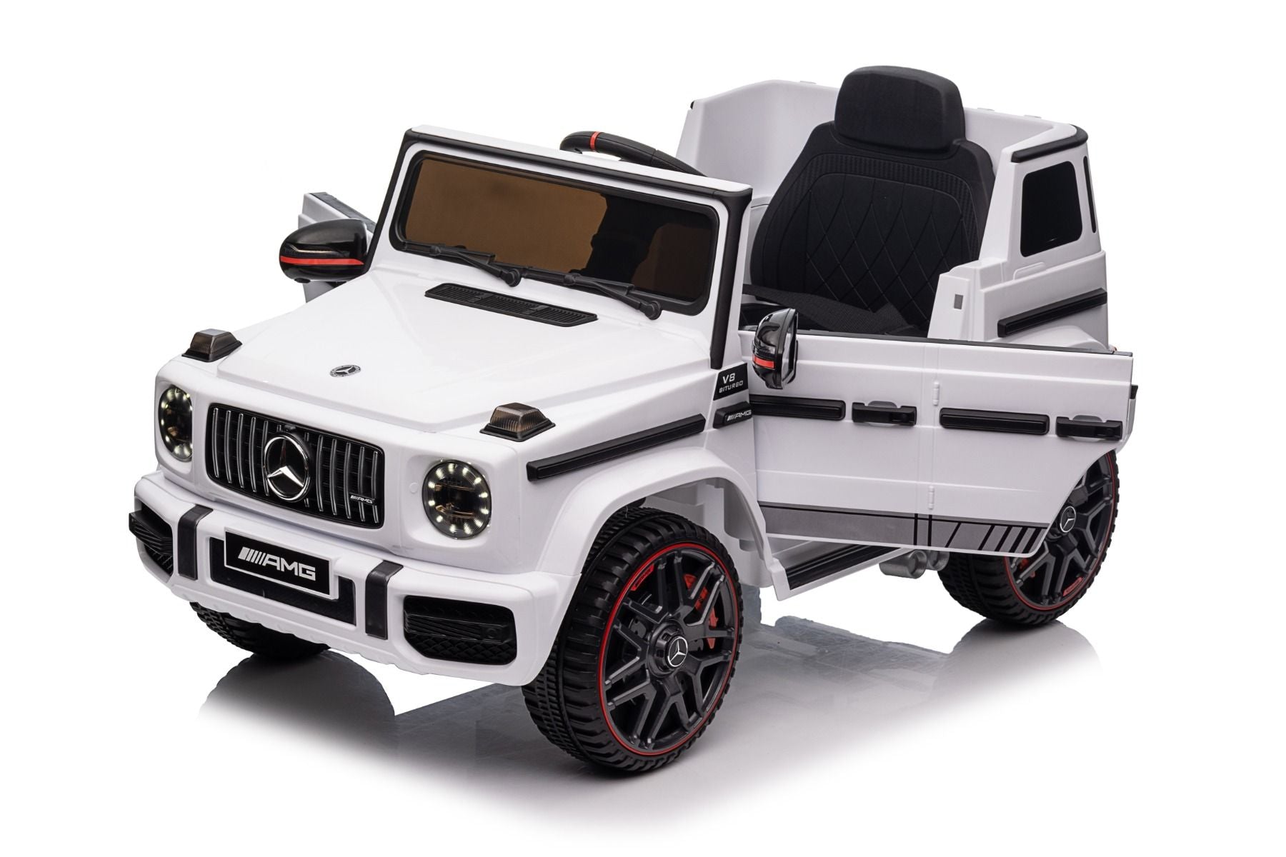 Voiture électrique enfants 12V Mercedes AMG G63 neuve, blanc, avec licence d'origine, porte à batterie, ouverture par des portes, monoplace, 2x moteur, batterie 12 V, télécommande de 2,4 Ghz, suspension arrière, démarrage en douceur